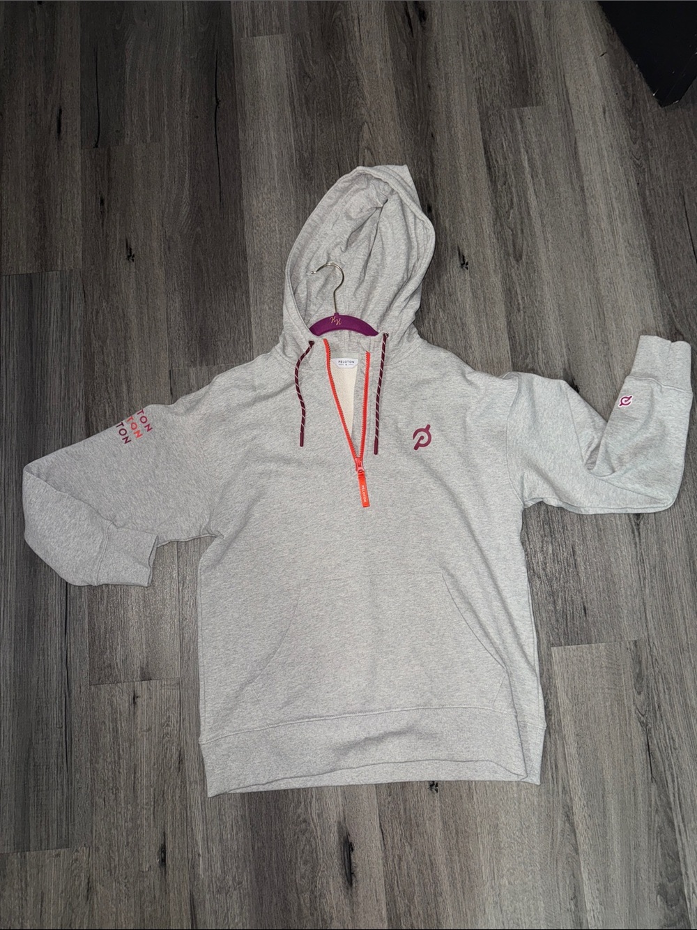 Peloton Light Gray Quarter-Zip Hoodie with Pink Accents